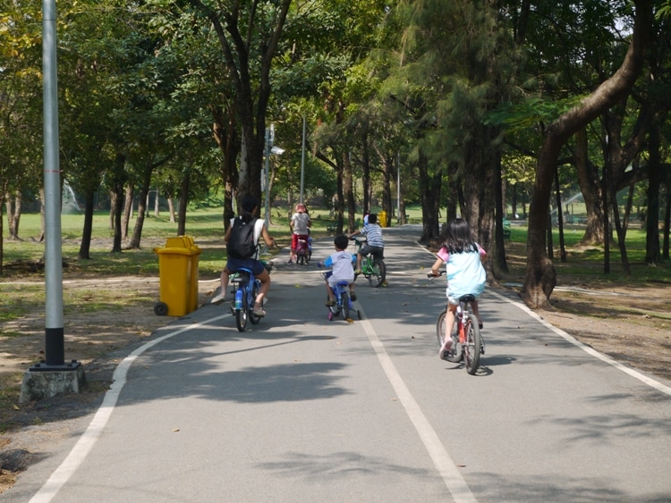Families Cycling At Rot Fai Park, Bangkok