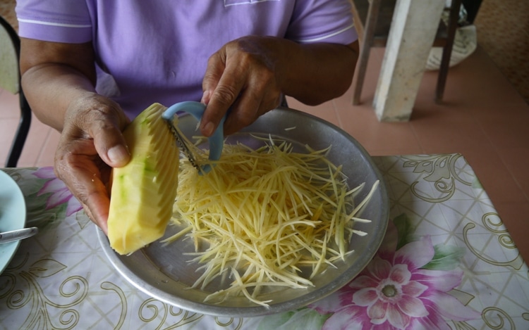 Cutting The Papaya