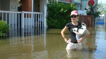 Miu Outside Her Flooded House