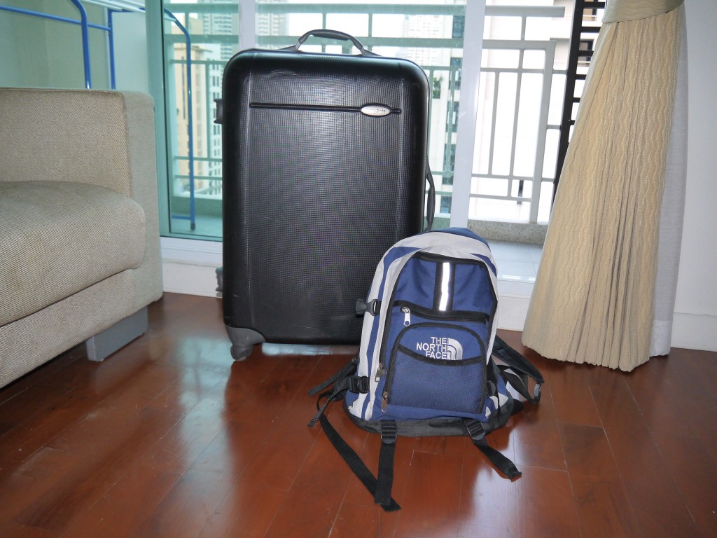 suitcase-and-backpack samsonite suitcase and north face backpack