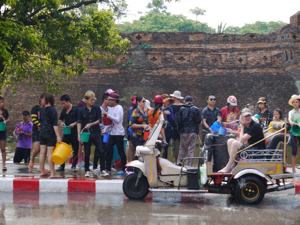 Tuk Tuk Passenger Getting Drenched At Chiang Mai Songkran Tuk Tuk Passenger Getting Drenched At Chiang Mai Songkran
