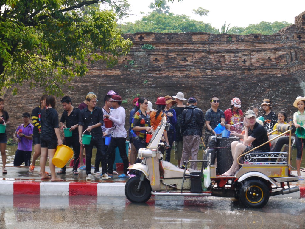 Tuk Tuk Passenger Getting Drenched At Chiang Mai Songkran