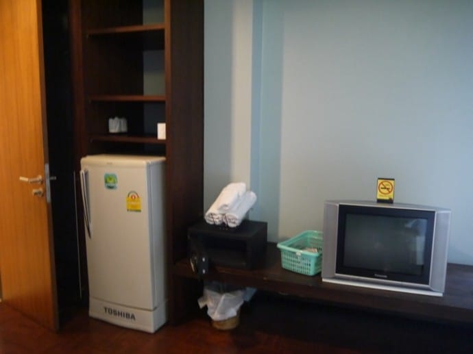 Wardrobe, Fridge, Safety Deposit Box And TV