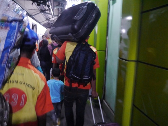 A Porter Carrying Our Bags