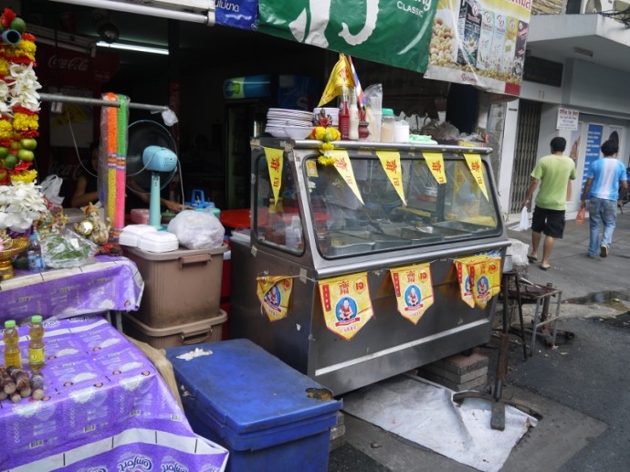 Yellow Veggie Flags On Pan Road Veggie Stall