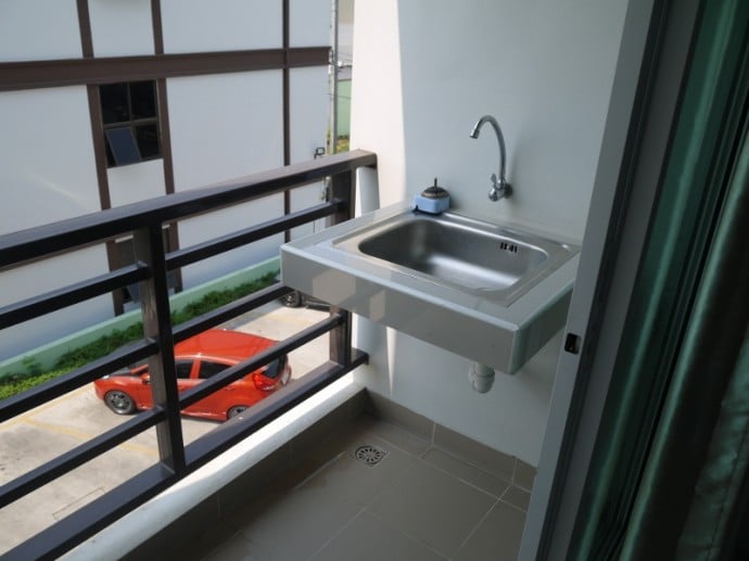 Balcony With Sink At Sawairiang Place Hotel, Korat Balcony With Sink At Sawairiang Place Hotel, Korat