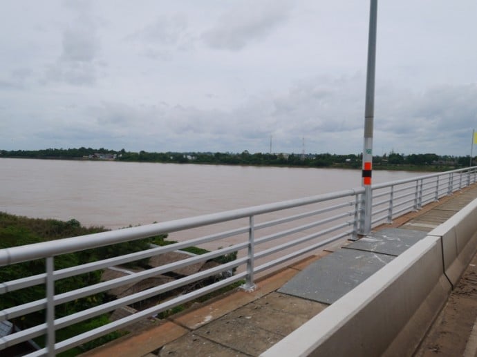 Crossing The Mekong River On The Thai-Lao Friendship Bridge