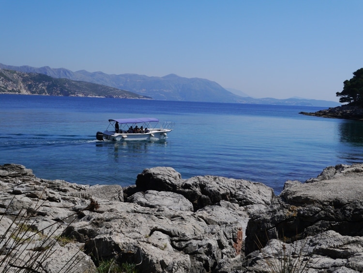 A Small Boat Passing Lokrum Island